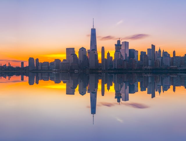 New,York,City,Skyline,Reflections,At,Sunrise