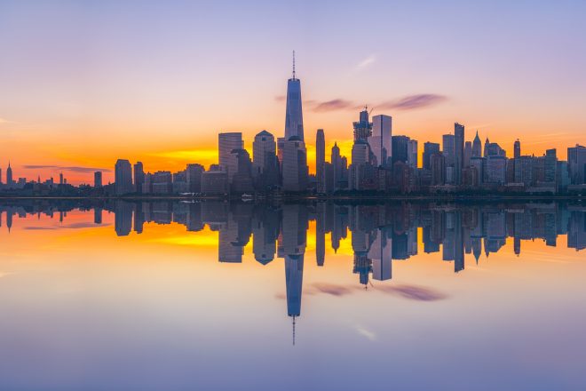 New,York,City,Skyline,Reflections,At,Sunrise