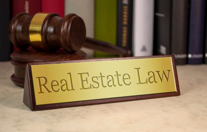 Golden,Sign,With,Gavel,And,Real,Estate,Law