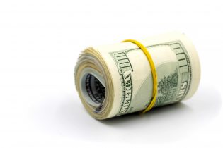 Bundle,Of,Money,Roll,Of,Dollars,Isolated,On,White,Background,